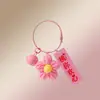 Llavero de flor de pompón de ganchillo, colgante para bolso, accesorio exquisito y práctico para estudiantes, regalo de graduación para profesores