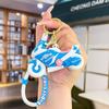 Nuevo llavero de motocicleta Sanrio Muñeco de dibujos animados colgante para mochila de escuela pareja accesorios llavero de coche pequeño regalo