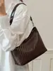 Bolsa Feminina de Axila 2026 Nova Tendência Verão Luxo Leve Nicho Padrão Trançado Bolsa de Ombro para o Trabalho Transversal Bolsa Saco