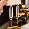 Europeu e Americano oco longo borla brincos moda vento frio design personalidade eardrop nicho brincos Coringa atacado