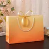 Bolso de Mano Estilo Ins con Degradado Naranja y Decoración de Moño Bolsa de Regalo de Papel Creativa y Hermosa Bolsa para Envolver Regalos