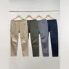 Calça multi-bolsos com costura de quatro cores 3568
