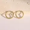 Moda Europea y Americana Suministro Transfronterizo Pendientes de Acero Inoxidable 316 Hebilla de Oreja Redonda Simple Pendientes de Perforación Joyería Fábrica de Origen