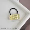 Diseño de nicho personalidad aleación cóncavo-convexo elástico anillo para el pelo todo-partido viento frío geométrico cuerda para el pelo retro temperamento cuerda para la cabeza