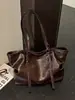 Bolso tote retro de gran capacidad transfronterizo para mujer, nueva colección 2026, bolso de hombro simple y elegante, bolso de mano versátil