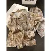 Pijama de lujo ligero de alta gama con estampado de leopardo para mujer, nueva colección de otoño, conjunto de manga larga y pantalón largo de seda helada, ropa de estar holgada que también se puede usar como ropa exterior