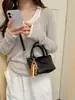 Bolsa de Tecido Nova da Moda para Primavera/Verão 2026 Bolsa de Mão Estilo Balde de Alta Qualidade Versátil Tendência Bolsa de Ombro Transversal