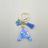Llavero de resina azul con forma de carta de amor, hecho a mano con pegamento de cristal, mariposa con borla, colgante para bolso, venta al por mayor