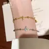 Xigu H0177 Pulsera de Mariposa Dorada de Plata S925 Completa Retro Francés Lujo Accesible Joyería de Mano de Nicho de Gama Alta para Mujeres