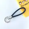 Chaveiro de corda trançada com anel duplo chaveiro de couro PU colorido novo pingente para bolsa feminina chaveiro para pendurar na cintura