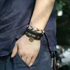 Pulsera de Cuero Vacuno Genuino Estilo Étnico Transfronterizo Pulsera Corazón de Durazno Caliente Traje de Hombre Cuerda de Cuero Tejida Pulsera con Cuentas Suministro
