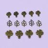Fábrica de acessórios de jóias DIY atacado 18K cor de ouro real retenção de flor titular oca pétala jóias contas de flor chapéu frisado