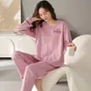 Pijama popular de comercio exterior para mujer, traje de pantalón largo de manga larga para primavera y otoño, ropa de casa simple y elegante para mujer, venta al por mayor