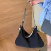 Bolsa de Lona para Mulheres, Novo Modelo de Primavera, Bolsa Tote de Grande Capacidade, Bolsa de Ombro Transversal de Nicho para o Dia a Dia de Alta Qualidade