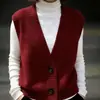 Cárdigan de punto verde retro de moda con escote en V profundo para otoño e invierno 2026, estilo francés maduro, chaleco adelgazante y versátil