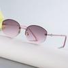 Gafas de sol modernas sin montura Uv400 Protección solar Gafas de moda europeas y americanas para mujer con un toque de alta gama Gafas de sol transfronterizas