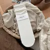 Novas meias cinza de algodão sem costura para outono e inverno, com cores da série Maillard, meias lisas de cano médio para mulheres