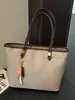 Bolsa de ombro texturizada retrô transfronteiriça 2026, bolsa tote de grande capacidade para mulheres, bolsa de mão simples e versátil para o dia a dia