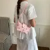 Bolso de Mano Pequeño de Moda y Popular 2026 Verano Nuevo Estilo Coreano Diseño de Nicho de Mano Bolso Simple de Hombro Cruzado Tipo Empanada