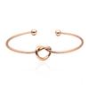 Pulseira de Aço Titânio com Nó Concentrico da Fábrica, Pulseira Aberta Simples de Laço de Amor, Joia Versátil Feminina em Estoque