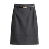 Saia de Lã Elegante Linha A Feminina 2026 Outono/Inverno Nova Cintura Alta Emagrecedora Curta Saia de Temperamento para o Trabalho Justa ao Corpo