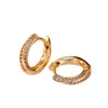 Aretes de oro con incrustaciones de diamantes simples, aretes de círculo de circonita con microincrustaciones exquisitas, aretes versátiles de lujo ligero para el viaje diario, venta al por mayor