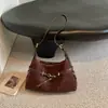Bolsa de ombro lisa retrô para mulheres, novo estilo 2026, bolsa de ombro casual e simples, bolsa transversal estilosa, bolsa tote de grande capacidade