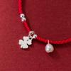 Plata S925 simple flor de la suerte de cuatro hojas Perla pulsera de cuerda roja tejida a mano joyería de mano DIY al por mayor C0642
