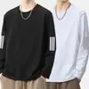 Camiseta de manga larga de otoño, capa base talla grande, cuello redondo para hombre, top simple y holgado, estilo coreano, camiseta estampada de moda