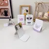 Nuevo espejo plegable de dibujos animados, espejo de escritorio para maquillaje para dormitorios de estudiantes, espejo pequeño portátil para que las niñas lo lleven en mochilas