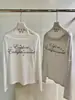 WGWE2026 Otoño Estilo Chica Caliente Americana Estampado de Letras Ajustado Ligeramente Transparente Hombros Descubiertos Manga Larga Camiseta W10842
