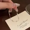 Pulsera de Perlas de Lujo Ligero de Nicho de Gama Alta para Mujer Estilo Coreano Moda Elegante Brillante Circonita Pulsera de Corazón Pulsera de Cristal