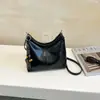 Nueva colección otoño/invierno 2026: Bolso de mano coreano simple, retro, moderno y versátil con un toque de alta gama, diseñado para mujeres, y se puede llevar como bandolera o bolso de hombro
