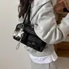 Bolso de mujer único de nicho estilo coreano, nuevo modelo primavera 2026, exquisito y elegante, bolso de hombro y bandolera simple y casual