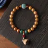 Hainan Semilla Dorada Cadena de Mano Grasa de Pollo Estrella Amarilla Luna Bodhi Madera de Durazno Flor de Loto Hombres y Mujeres Juego Cultural Pulsera de Cuentas Budistas Fabricante Mayorista