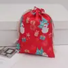 Venta Caliente de Amazon Lino Estampado de Navidad Bolsillo con Cordón Regalo para Niños Bolsa de Empaque con Cordón para Dulces al por Mayor