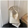 Bolsa feminina grande de capacidade, tecida, estilo vintage, nova tendência primavera 2026, bolsa de ombro e transversal tipo balde, estilosa