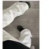 Jeans boca de sino branco estilo novo 2006 para homens, calças compridas casuais básicas soltas da moda primavera/verão, transfronteiriço
