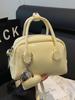 2025 Nova Bolsa de Bowling de Couro Oleoso Cremoso Estilo Coreano para Segurar na Mão Bolsa Transversal Versátil Estilo Ocidental para Commuter para Mulheres
