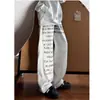 Calça Casual Graffiti com Slogan de Letras Retro Americana para Homens e Mulheres, Estilo de Rua Outono Calça Longa Casual Reta Empilhada