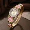 2025 Nuevo Reloj de Cuarzo con Flor Tallada Decorada con Diamantes para Mujer Moda Pulsera de Aleación Reloj para Mujer Hecho a Medida Entrega Directa