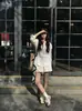Conjunto de Duas Peças Feminino Verão 2026 Estilo Old Money Camisa de Linho Manga Longa Solta e Casual + Shorts Casuais