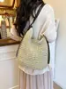 Bolso Tejido de Paja Casual de Comercio Exterior para Mujer Nuevo Modelo 2026 Alta Calidad Nicho Gran Capacidad Cruzado Bolso Cubo Tejido