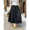 Falda tipo tulipán de lunares blancos estilo coreano con cintura elástica, versátil y estiliza, adecuada para figuras petite, falda de longitud media