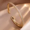 RAKOL Moda Luxo Leve Cobre Incrustado Zircônia Trevo de Quatro Folhas Aberto Ajustável Pulseira Feminina Nicho Toque de Alto Padrão Joia de Mão