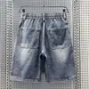 Shorts jeans retro americano com múltiplos bolsos para homens, calça de verão de cordão solta de perna larga de comprimento médio, shorts retos de cinco pontos estilo ins