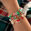 Pulsera elástica navideña para mujer, con diseño de Papá Noel, alce y árbol de Navidad, de cerámica suave y al azar.