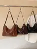 Bolsa de mão de couro de grande capacidade transfronteiriça para mulheres, novo modelo 2026, design de nicho, bolsa tote única e estilosa