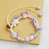 Jingdezhen Navidad Pulsera de Cuerda Trenzada de Cerámica Pulsera de Trébol de Cuatro Hojas Joyería Artística Hecha a Mano Venta al por Mayor Pulseras de Cerámica para Atracciones Turísticas