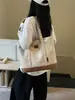 Bolsa de mano transfronteriza de gran capacidad con diseño simple, nueva moda de verano 2026, bolso de hombro versátil de alta calidad